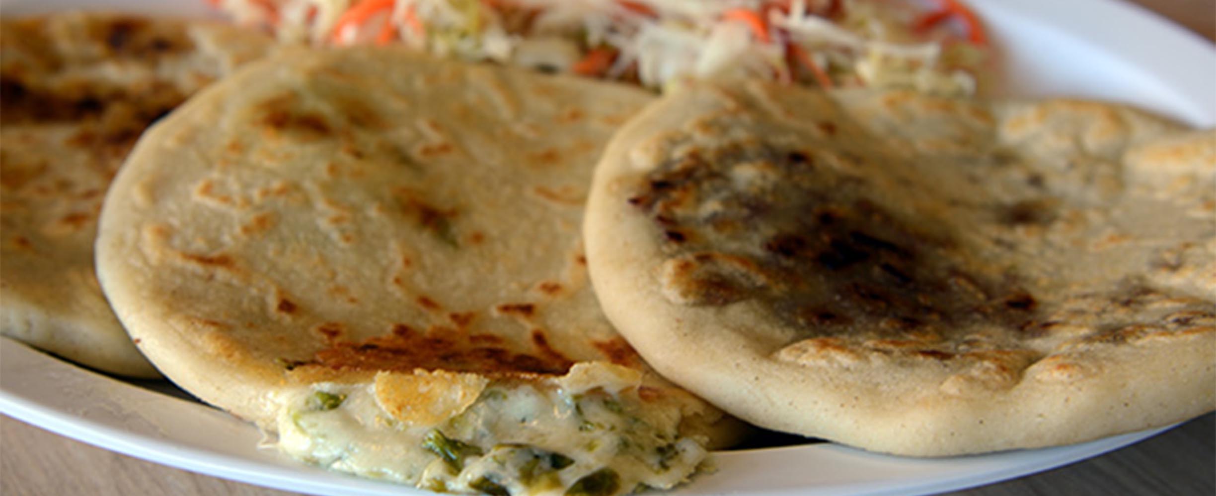 Pupusas, we make them from scratch every day, one by one, after you order them so they are s fresh and tasty as they can be. 